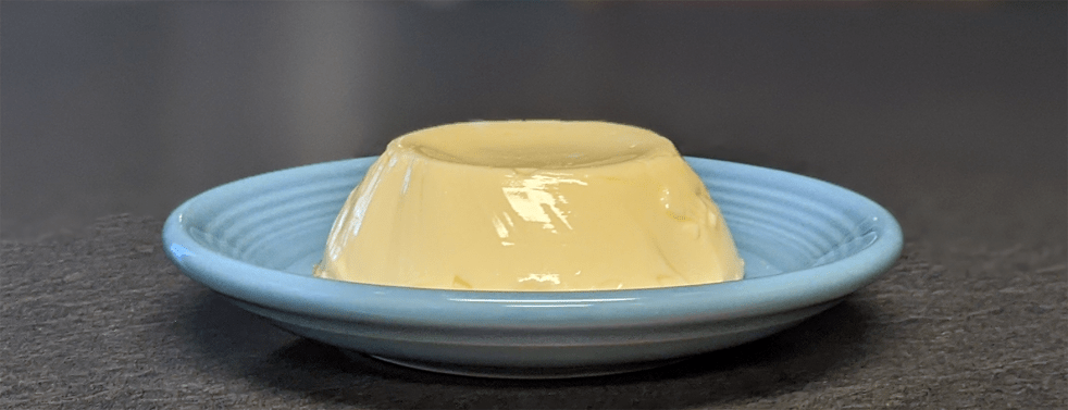 baked custard on a blue plate